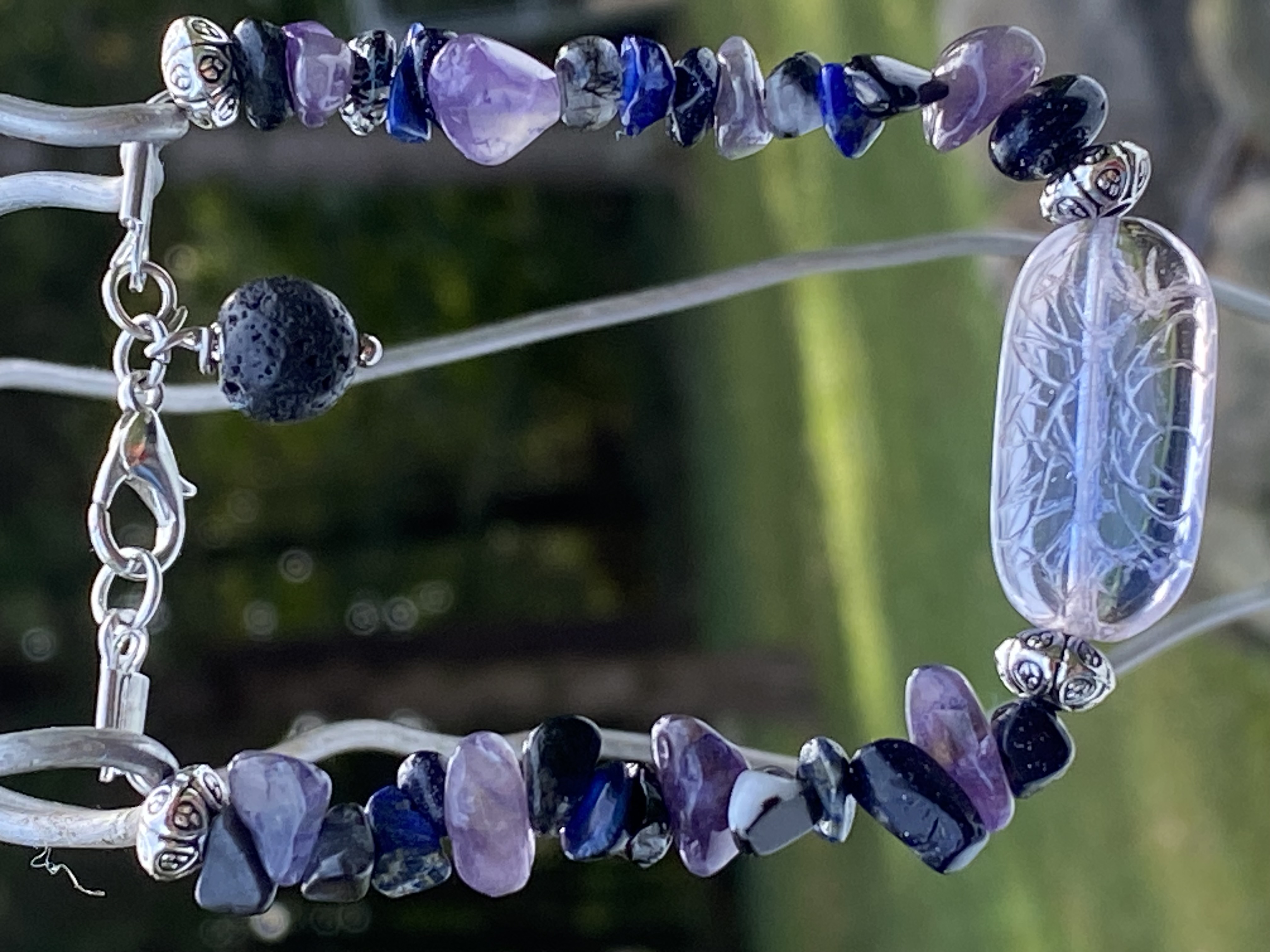 Amethyst with glass bead