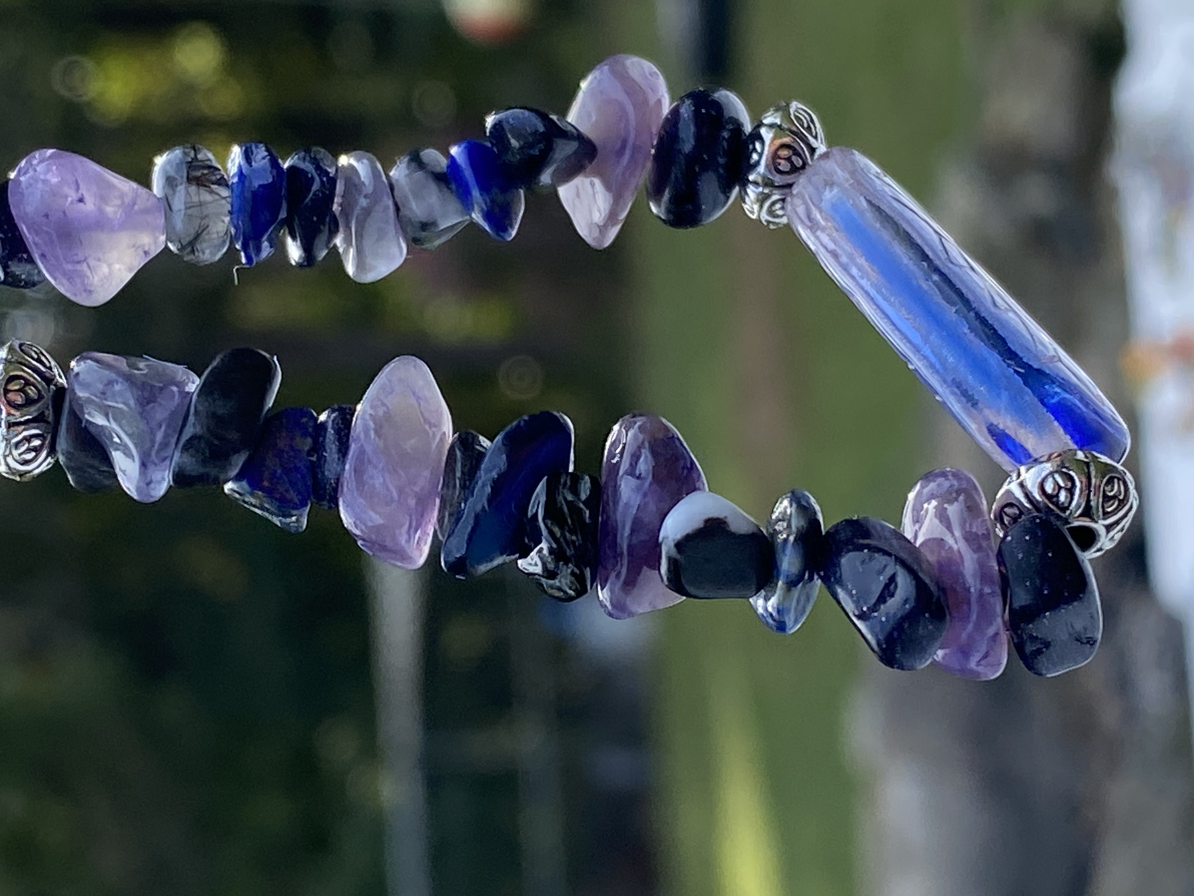 Amethyst with glass bead