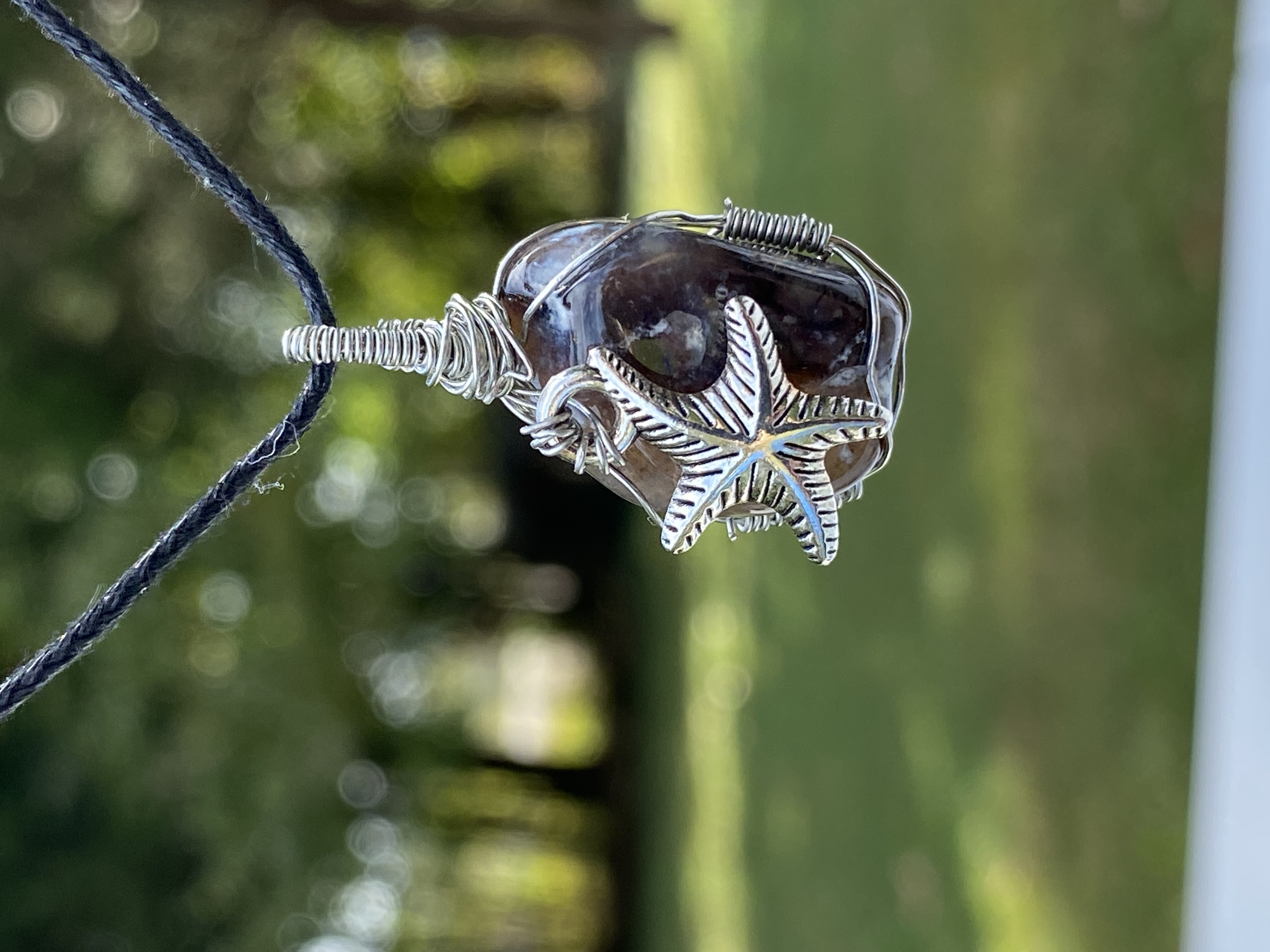 Starfish silver wrapped pendant